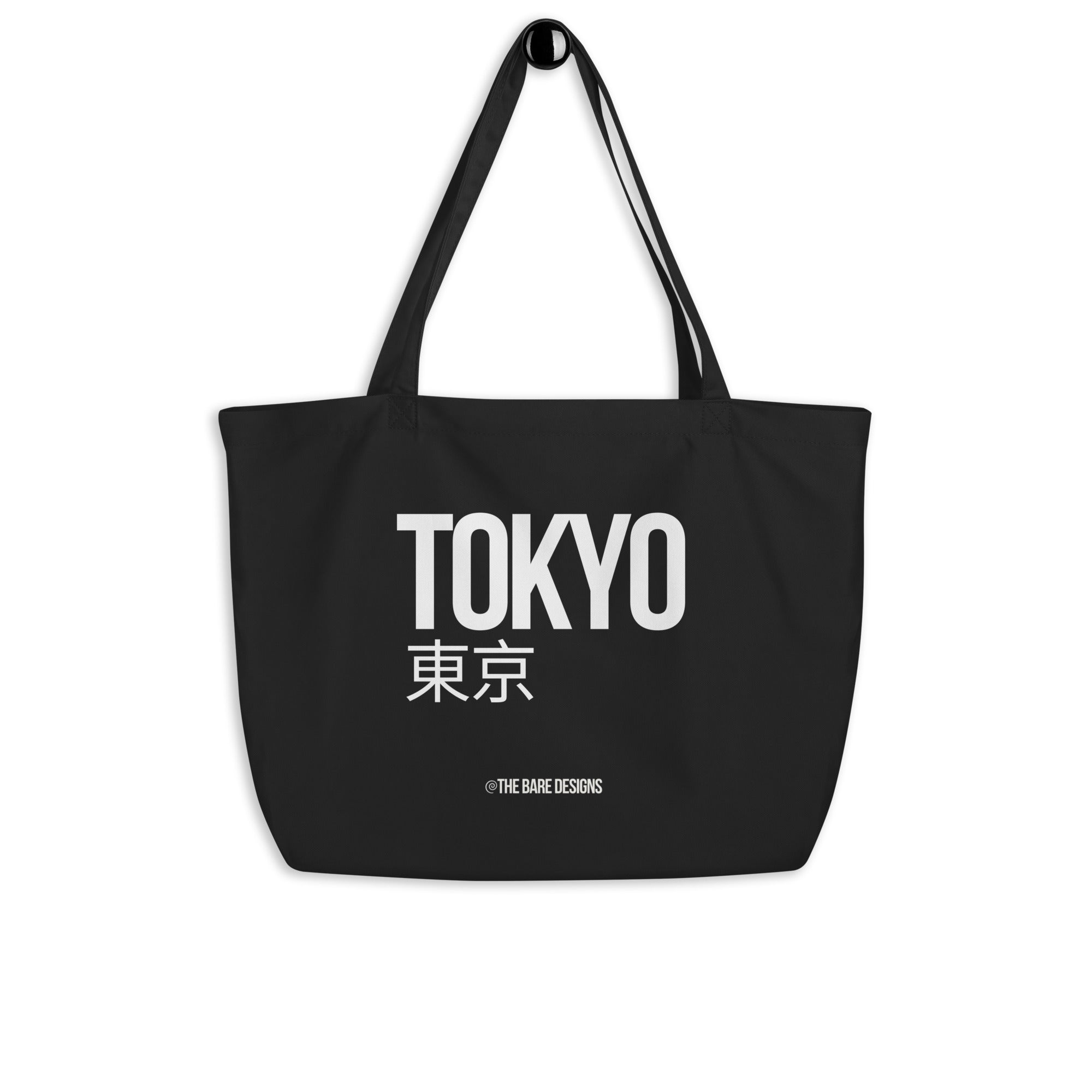 Black tote bag with 'TOKYO' and Japanese characters on a white background