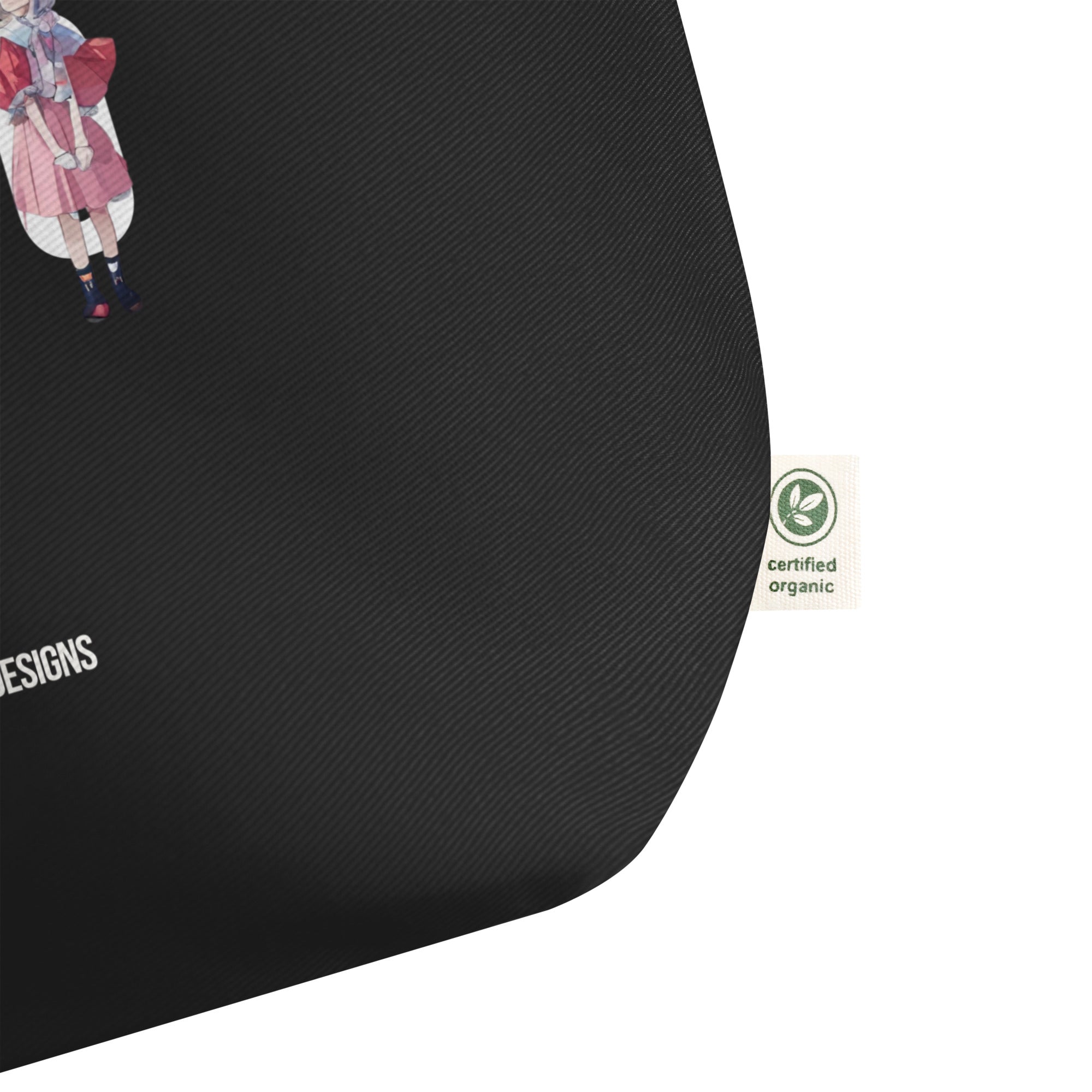 Black tote bag with a green certification label on a white background